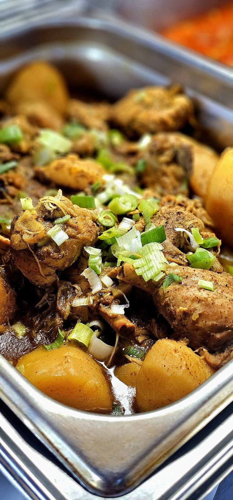 Brown stew chicken